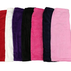 May include: Six plush bath wraps in different colors: red, white, purple, black, pink, and light pink. The wraps are made of soft, absorbent material and are perfect for drying off after a shower or bath.