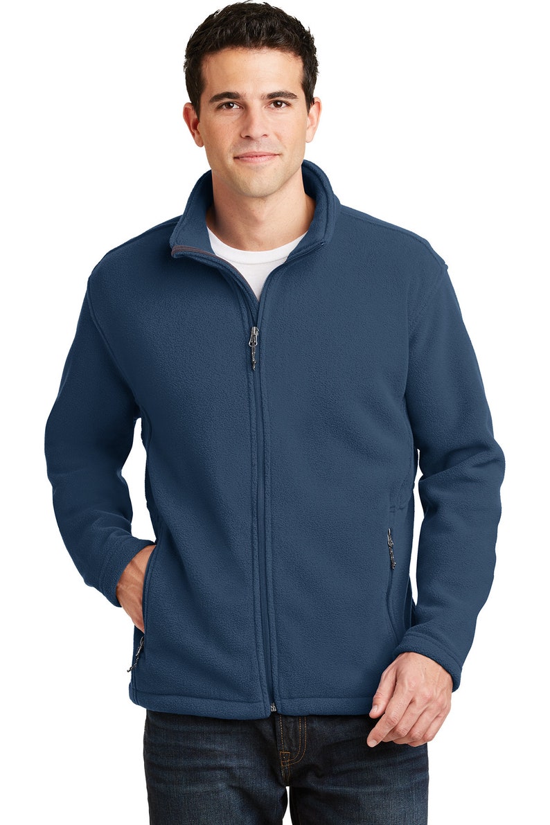 May include: A blue fleece jacket with a zipper closure and two zippered pockets. The jacket has a stand-up collar.