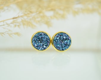 Gold stud earrings with cabochon in mineral look jeans blue