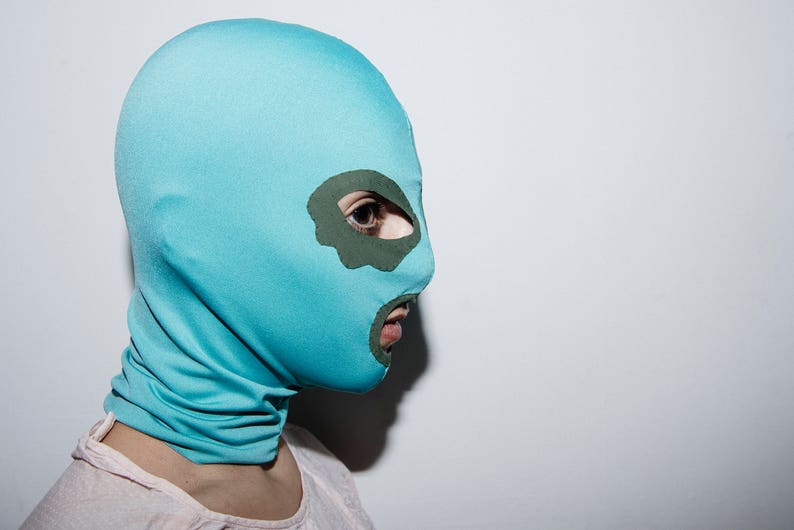 Pastel blue mask with khaki green eye contouring