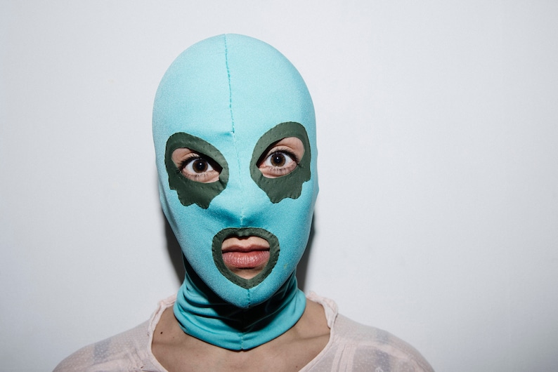 Pastel blue mask with khaki green eye contouring