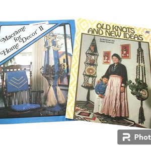 May include: Two vintage macrame books with colourful covers. The first book is titled "Macrame for Home Decor II" and features a macrame hanging plant holder. The second book is titled "Old Knots and New Ideas" and features a woman and child wearing traditional clothing, with macrame wall hangings and plant holders in the background.
