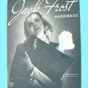 May include: Vintage magazine cover for "Jack Frost Handbags" featuring a woman holding a dark handbag with a geometric design. The cover has the text "Jack Frost HANDBAGS" in white script. The magazine is Volume 48.