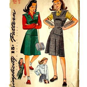 May include: Vintage Simplicity pattern 1074, featuring illustrations of two young women in dresses. The pattern includes a size 12 and bust 30 measurement. The cover is aged with text that reads "Simplicity 15¢ Pattern".