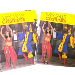 May include: McCall's Costumes sewing pattern number 2814 for a jester and a belly dancer costume. The pattern includes instructions and diagrams for making the costumes. The jester costume is blue and yellow with a red and white diamond pattern. The belly dancer costume is red and gold with a gold belt and a gold headpiece.