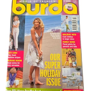 May include: A magazine cover for Burda, a fashion magazine, with the title "Our Super Holiday Issue" and the text "Over 80 ideas for the best summer ever!" The cover features a woman in a white dress standing in the water on a beach, a woman in a blue shirt standing on a beach, and a family standing in front of a house.