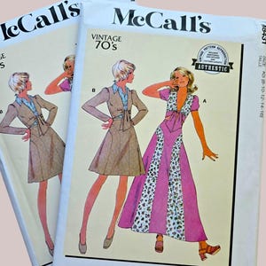 May include: Two identical McCall's sewing pattern envelopes labeled Vintage 70's. The illustrations show a tan jacket and skirt set, and a long pink dress with a floral panel. The text includes McCall's, Vintage 70's, and Authentic Pattern Reproduction.