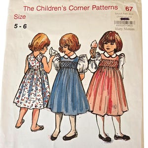 May include: A vintage sewing pattern titled "The Children's Corner Patterns" featuring illustrations of three children in dresses. The pattern is size 5-6. The cover includes the text "Mary De".