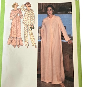 May include: A vintage Simplicity sewing pattern packet with a green border and the number 8773. The packet shows illustrations of a long nightgown and pajamas. The text on the packet reads "MISS JEUNE FEMME".