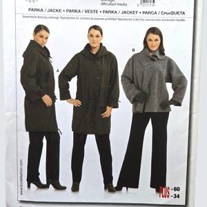 May include: A Burda 7711 sewing pattern envelope for a parka and jacket. The front displays illustrations of two parka styles and one jacket style, along with European sizes 44 to 60 and US sizes 18 to 34. Text includes "PARKA / JACKE" and "ALL PATTERNS WITH SEAM AND HEM ALLOWANCES."