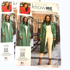 May include: Three sewing pattern packets featuring a woman in a green coat and cream-colored pants. The packets have the text "KNOW ME" and "BEAUTE J'ADORE". The packets also have a QR code and the text "Designed and Printed in USA".