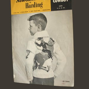 May include: Vintage children's cowboy sweater pattern from "Nordic Sportsman Newlands or Harding." The cover features a boy wearing the sweater with a colorful design. The pattern is for sizes 4-6-8-10 and costs 25 cents.