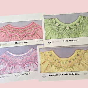 Könnte beinhalten: Vier Karten mit Designs für gerüschte Joche in Rosa, Grün und Gelb. Die Karten zeigen die Namen "Heaven Sent", "Daisy Dunkers", "Pretty in Pink" und "Samantha's Little Lady Bugs". Die Designs sind für Kinderkleidung.