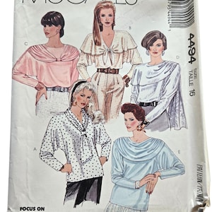 May include: A vintage McCall's sewing pattern envelope featuring illustrations of women's blouses. The envelope is white with the McCall's logo and the number 4494. The text "Focus on Overlock (Serger) Sewing" is also visible.