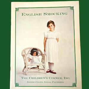May include: A vintage book cover titled "English Smocking" featuring a young girl in a white dress and a doll in a wicker chair. The cover also includes the text "The Children's Corner, Inc. Instructions, Ideas, Patterns."