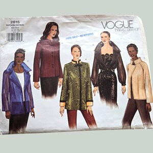May include: A vintage Vogue Basic Design sewing pattern, featuring illustrations of five different women's fashion designs. The pattern includes a jacket, dress, and coat. The pattern number is 2615, with sizes 8-10-12. The text "FINAL SALE - NO RETURNS" is visible.