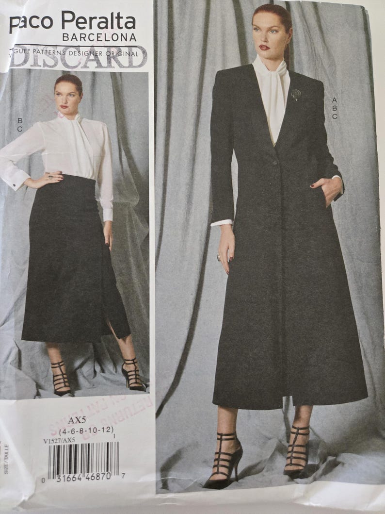 May include: A sewing pattern by Paco Peralta, Barcelona. The pattern features a long, dark gray coat with a notched collar and a matching skirt. The pattern also includes a white blouse. The pattern size is AX5 (4-6-8-10-12).