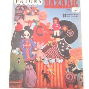 May include: A vintage Patons Bazaar magazine cover featuring various knitted and crocheted items. The cover displays dolls, a dragon, a rabbit, and other handmade crafts. The magazine's title and issue number are visible.