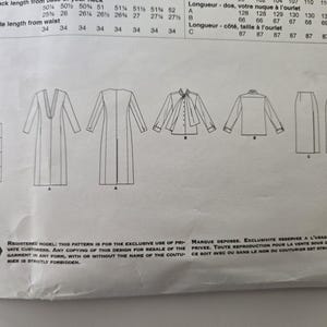 May include: A white paper sewing pattern with illustrations of various garment designs, including a long coat, a blouse with a bow, a button-down shirt, and a skirt. Measurements are listed in inches. The Vogue Pattern Service logo is visible.
