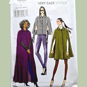 May include: A Very Easy Vogue pattern, V8959, featuring illustrations of three capes. The capes are in black and white houndstooth, deep purple, and olive green. The pattern includes sizes X-Small to Medium.