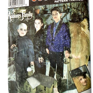 May include: Simplicity Costumes pattern featuring The Addams Family. The cover shows children dressed as characters from the movie. The costumes include a black dress, a purple jacket, and a furry costume.