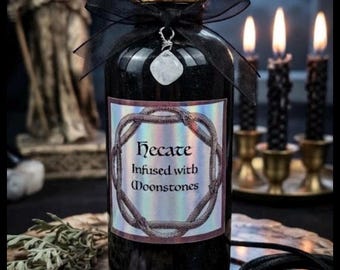 Aceite perfumado Hécate de 59 ml con piedras lunares – Fragancia cálida, especiada y avainillada para rituales de unción