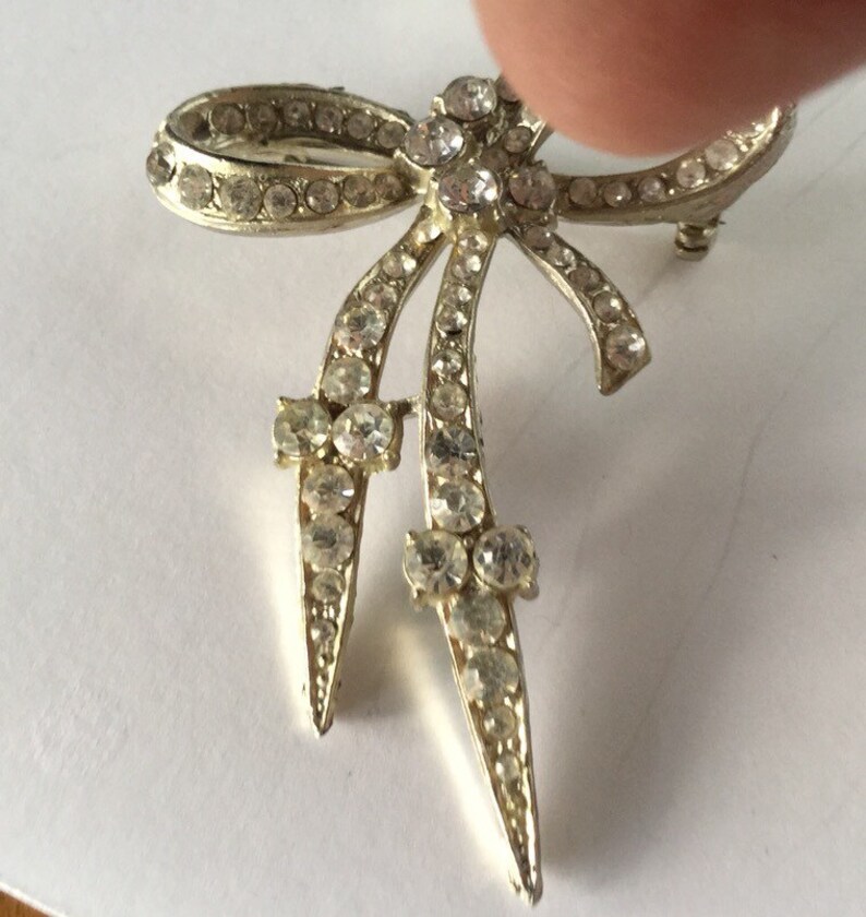 Vintage Rhinestone Bow Brooch Silver Tone Setting