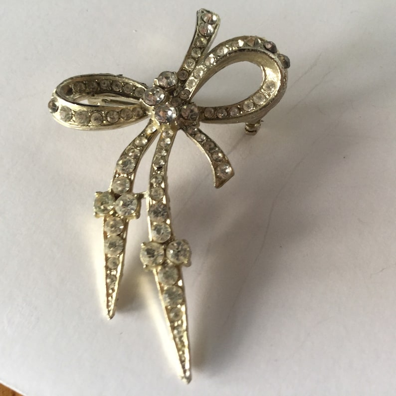 Vintage Rhinestone Bow Brooch Silver Tone Setting