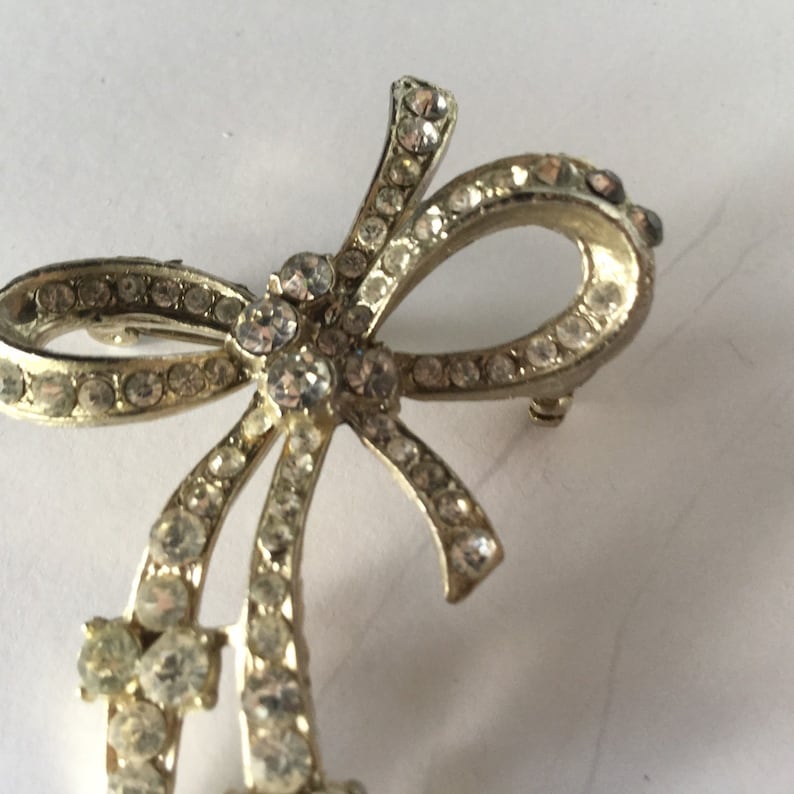 Vintage Rhinestone Bow Brooch Silver Tone Setting