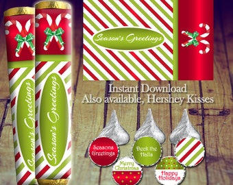 May include: Printable Christmas candy bar wrappers with a red and green striped pattern and candy cane design. The wrappers say "Season's Greetings".