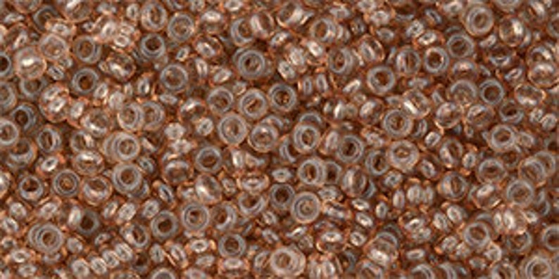 10 g Perles Toho 11/0 Demi Rondes Hybrides Noisette Transparente TN-11-YPS0045 Rocailles Taille 11 Cuivre Métallique image 1