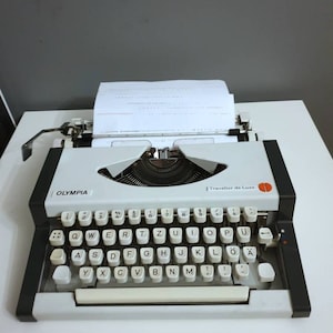 Olympia traveller de luxe typewriter - Vintage Typewriter -office decor - not work
