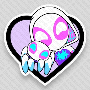 Op de afbeelding: Een witte en roze cartoon spin-persoon met een blauw en paars spinnen symbool op haar borst, die een kleine witte spin met blauwe ogen in haar handen houdt. De afbeelding is in de vorm van een hart.