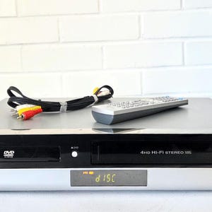LG V194H - DVD / VCR Kombi-Player / DVD-Rekorder mit Hdmi S-Video Port Silber Keine Fernbedienung mit Originalfernbedienung + Kabel - Getestet und funktioniert