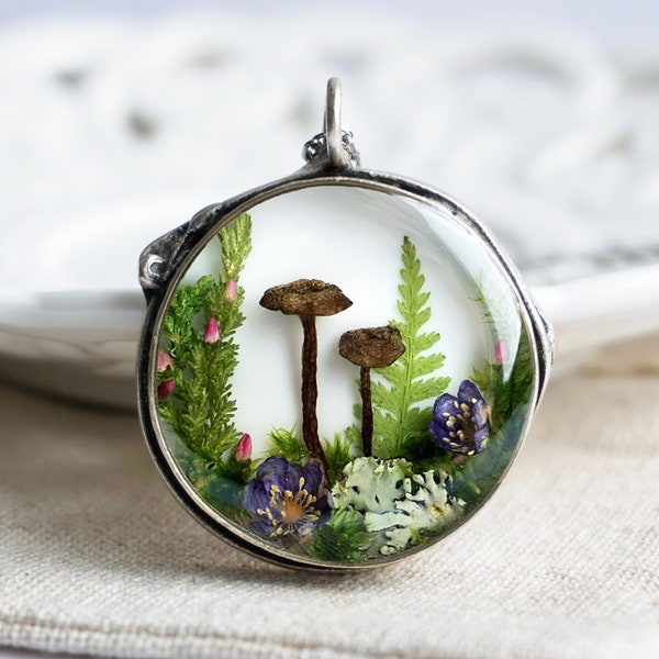 Forest pendant with real mushrooms, hepatica flowers, fern, pink heather, lichens and moss. Real Dried mushroom jewelry.