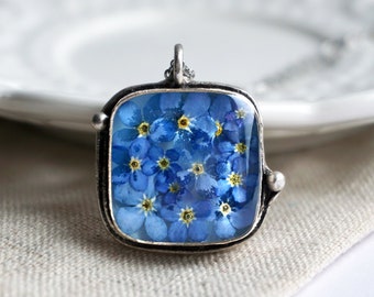 Botanical necklace with real Forget me not flowers. Floral pendant