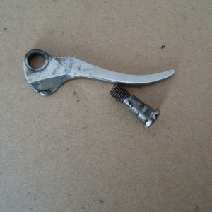 Vintage 1900 15K Lifter lever with shouldered screw Sewing machine Simanco part as removed and shown vintage original part