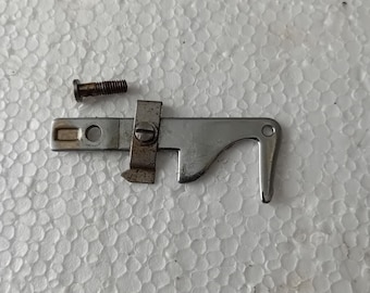 Singer 99K Slack Thread regulator from 1940s sewing machine Simanco 33676
