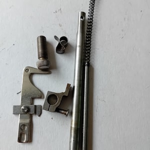 Singer 99K presser bar rod assembly with spring, slack thread regulator, etc. Simanco 33676 33619 33624 33657 etc