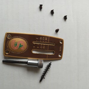 Vintage Singer 185K Sewing machine stitch length indicator cover plate with lever, spring & bolts/screws as removed and shown vintage  part