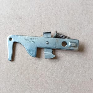 Singer 99K Slack Thread Regulator 33667 Genuine vintage part