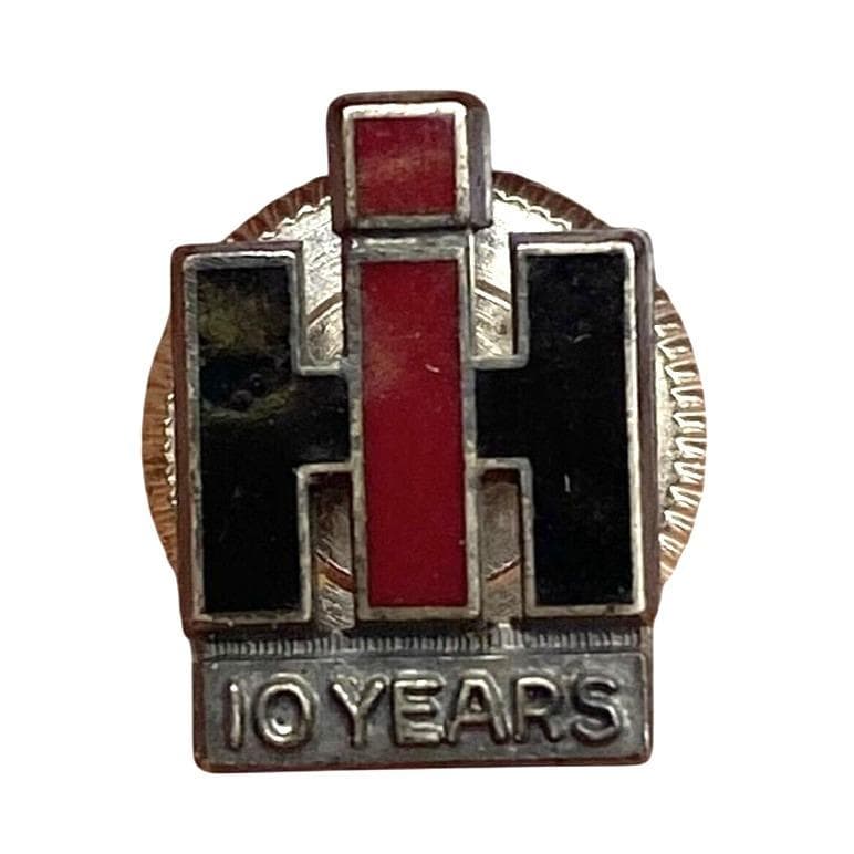 Odznaka pracownika International Harvester ze srebra próby 925 za 10 lat służby