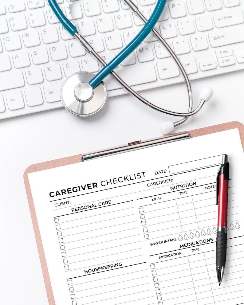 May include: A caregiver checklist with sections for personal care, housekeeping, nutrition, and medications. The checklist is printed on white paper and has a black and white design. A red pen is lying on the checklist.