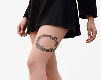 Medias con tatuajes de Ouroboros