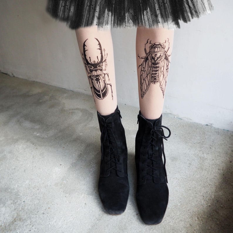 Hand-painted tattoo socks featuring intricate cicada and beetle artwork, perfect for entomology lovers, bug enthusiasts, and goblincore fashion. These unique, nature-inspired socks create a realistic tattoo illusion, combining art and style in wearable form. A thoughtful and quirky insect-themed gift for those who appreciate novelty and handcrafted designs.
