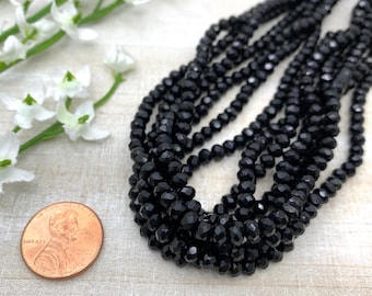 Vidrio facetado negro opaco de 4 x 3 mm - Tira de 16,5 pulgadas