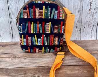 Rifle Paper Co Book Club Mav Pack, Curio Fabric Crossbody Mini Backpack with Adjustable Strap