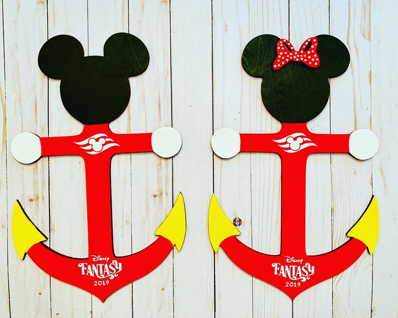 May include: Two red wooden anchors with Mickey Mouse and Minnie Mouse heads. The anchors have white and yellow accents and the text "Disney Fantasy 2019" on the bottom.