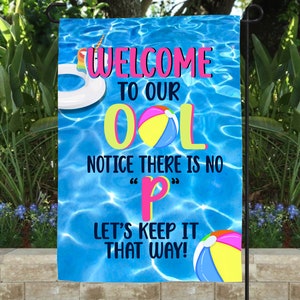 May include: A blue and white garden flag with a pool scene and the text "WELCOME TO OUR POOL NOTICE THERE IS NO "P" LET'S KEEP IT THAT WAY!"