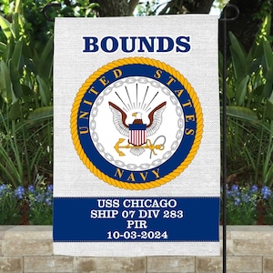 May include: A white garden flag with a blue and gold United States Navy seal. The seal features a bald eagle with a shield and an anchor. The text "BOUNDS" is at the top of the flag. The text "USS CHICAGO SHIP 07 DIV 283 PIR 10-03-2024" is at the bottom of the flag.